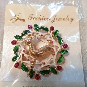 Brooch with a reindeer in it